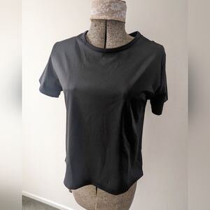Women's Small Black Workout Shirt. Slit detail on the back.